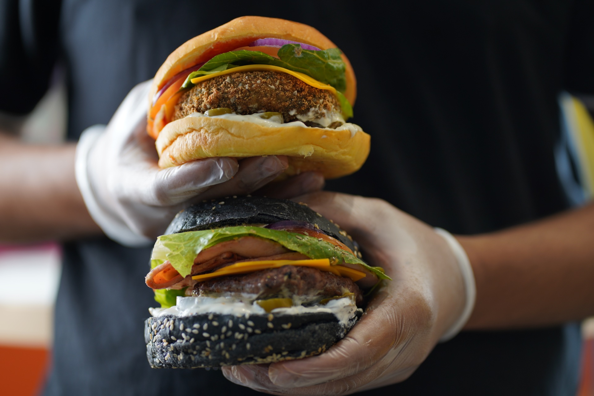 Two El Burgerritos burgers made fresh by the team